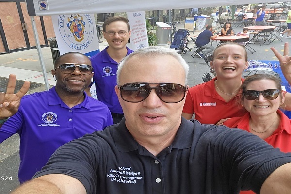 Group of people with BCC director Peter Fosselman